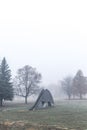Empty children`s playground on a foggy autumn morning