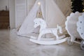 children& x27;s playroom with tent and rocking horse Royalty Free Stock Photo