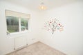 Empty childs bedroom with wall mural Royalty Free Stock Photo