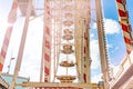 Empty Christmas ferris wheel against blue sky