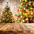 Empty christmas table background with christmas tree out of focus for product display montage Royalty Free Stock Photo