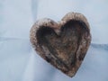 empty cigarette ashtray in the shape of a heart