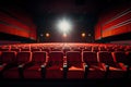 Empty cinema auditorium with red seats and spotlights, 3d render, Bright empty red seats in cinema rows, AI Generated Royalty Free Stock Photo