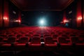 Empty cinema auditorium with rows of red seats illuminated by spotlights, Bright empty red seats in cinema rows, AI Generated Royalty Free Stock Photo