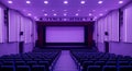 Empty Cinema Hall with Purple Lighting and Large Screen Royalty Free Stock Photo