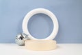 Empty circle frame for object presentation or text against blue background Royalty Free Stock Photo