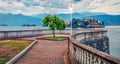 Empty city park in Stresa town. Wonderful summer susnset on Maggiore lake with Bella island on background, Province of Verbano-Cus Royalty Free Stock Photo