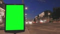 Empty citylight box stands by road at buildings timelapse