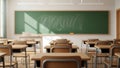 Empty Classroom with Desks and Chalkboard Bathed in Sunlight Royalty Free Stock Photo