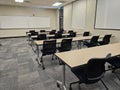 Empty classroom interior, with rows of desks Royalty Free Stock Photo