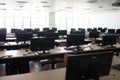 Empty classroom with lots of computers, or open workspace Royalty Free Stock Photo