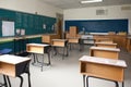 empty classroom, ready for a new school year with chalkboard and blackboard in place Royalty Free Stock Photo
