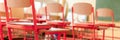 Empty classroom with school desks, chairs and blackboard. Education concept. Royalty Free Stock Photo