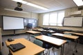 empty classroom setup with smartboard, projector, and laptop for modern learning Royalty Free Stock Photo