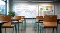 Empty classroom with student desks facing whiteboard Royalty Free Stock Photo