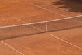 Empty clay tennis court and net. Professional sport concept. Horizontal sport poster, greeting cards, headers, website Royalty Free Stock Photo