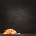 Empty clean black chalk Board. chalk and rag lie against. concept: back to school background Royalty Free Stock Photo