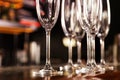 Empty clean champagne glasses on counter in bar Royalty Free Stock Photo
