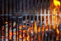 Empty Clean Charcoal BBQ Grill With Vibrant Flames On The Black Background. Cookout Concept.