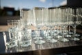 empty clean glass glasses for alcoholic drinks in a restaurant on a bar counter Royalty Free Stock Photo