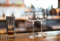 empty clean glass glasses for alcoholic drinks in a restaurant on a bar counter Royalty Free Stock Photo