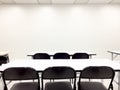 Empty clean room with chairs and tables for training,meeting Royalty Free Stock Photo