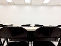 Empty clean room with chairs and tables for training,meeting Royalty Free Stock Photo