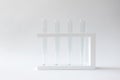 Empty clean test tubes in rack on white background with copy space. Concept laboratory research, scientific experiment Royalty Free Stock Photo