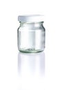 Empty clear glass jar, white cap in front view, and reflection isolated on white background, Suitable for Mock up creative graphic Royalty Free Stock Photo