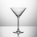 Empty clear glass martini cocktail glass on a reflective surface martini glass drinking glass Royalty Free Stock Photo