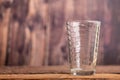 Empty clear glass of water on the wooden table