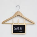 empty clothes hanger sale sign Royalty Free Stock Photo