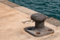 Empty coastal mooring or towing bollard for the boat, yacht or vessel Royalty Free Stock Photo