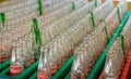 Empty Coca Cola bottles kept in factory storage,