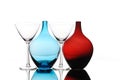 empty cocktail glasses and blue red special bottles Royalty Free Stock Photo