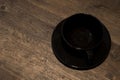 Empty coffee black cup on wooden background. Royalty Free Stock Photo