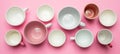Empty coffee cups white and pink color against pink background, banner Royalty Free Stock Photo