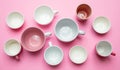Empty coffee cups white and pink color against pink background Royalty Free Stock Photo