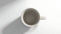 Empty Coffee Mug on White Surface Royalty Free Stock Photo