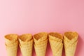 Empty Colorful Pastel Toning Ice Cream Cones on Pink Background.