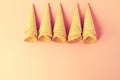 Empty Colorful Pastel Toning Ice Cream Cones on Pink Background. Royalty Free Stock Photo