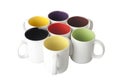 Empty colorful porcelain mugs