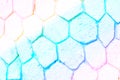 Empty colorful wall made of different sizes rocky hexagons with copy space.