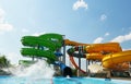 Empty colorful waterslides and pool Royalty Free Stock Photo