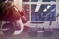 Empty comfort sport fitness gym club at night with window and iron barbells dumbbells Royalty Free Stock Photo