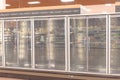 Empty commercial fridges at grocery store in America Royalty Free Stock Photo