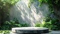 Empty concrete podium amidst vibrant green plants and soft sunlight shadows display Royalty Free Stock Photo