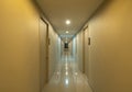 Empty condo, hotel or apartment corridor hall way in condominium building, modern interior design decoration room. Walkway Royalty Free Stock Photo