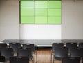 Empty Conference With Green Screen And Chairs Laid Out For Presentation