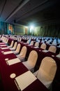 Empty conference hall with red table Royalty Free Stock Photo